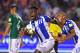 Honduras' Alberth Elis (L) and Eddie Hernandez celebrate after scoring against Mexico during their 2018 World Cup qualifier football Match in Olimpico Metropolitano stadiun in San Pedro Sula on October 10, 2017. / AFP PHOTO / ORLANDO SIERRA (Photo credit should read ORLANDO SIERRA/AFP/Getty Images)