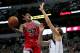 DALLAS, TX - OCTOBER 04: Kris Dunn #32 of the Chicago Bulls shoots against Dirk Nowitzki #41 of the Dallas Mavericks in the first half at American Airlines Center on October 4, 2017 in Dallas, Texas. NOTE TO USER: User expressly acknowledges and agrees that, by downloading and or using this photograph, User is consenting to the terms and conditions of the Getty Images License Agreement. (Photo by Tom Pennington/Getty Images)