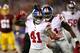 LANDOVER, MD - JANUARY 01: Cornerback Dominique Rodgers-Cromartie #41 of the New York Giants reacts with teammate strong safety Landon Collins #21 of the New York Giants after sacking quarterback Kirk Cousins #8 of the Washington Redskins (not pictured) in the second quarter at FedExField on January 1, 2017 in Landover, Maryland. (Photo by Patrick Smith/Getty Images)