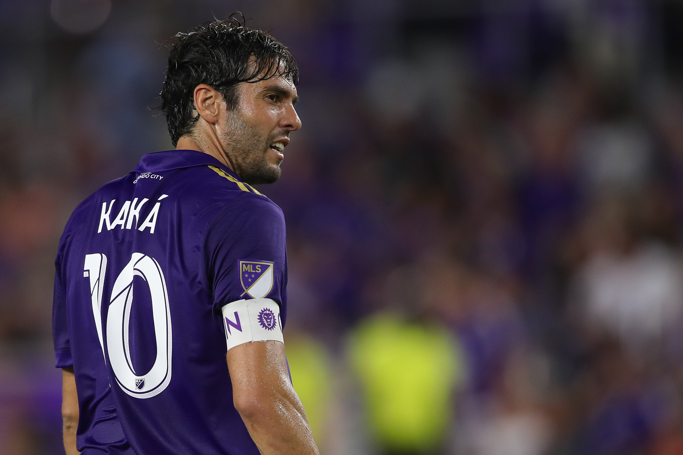 Brazilian soccer star Kaka smiles as he arrives at Orlando International  Airport, Monday, June 30, 2014, in Orlando, Fla. Kaka is the first  designated player to sign with the Orlando City Soccer