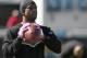 New Orleans Saints cornerback Tracy Porter warms up prior to an NFL football game against the Jacksonville Jaguars in Jacksonville, Fla., Sunday, Oct. 2, 2011.(AP Photo/Phelan M. Ebenhack)