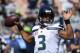 Seattle Seahawks quarterback Russell Wilson warms up before an NFL football game against the Los Angeles Rams Sunday, Oct. 8, 2017, in Los Angeles. (AP Photo/Mark J. Terrill)