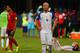 COUVA, TRINIDAD AND TOBAGO - OCTOBER 10: A contrast of emotions as captain Michael Bradley (C) of the United States mens national team reacts as Trinidad and Tobago pull of a win during the FIFA World Cup Qualifier match between Trinidad and Tobago at the Ato Boldon Stadium on October 10, 2017 in Couva, Trinidad And Tobago. (Photo by Ashley Allen/Getty Images)
