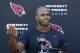 New Arizona Cardinals running back Adrian Peterson answers a question during an NFL football news conference at the team's training facility Wednesday, Oct. 11, 2017, in Tempe, Ariz. (AP Photo/Ross D. Franklin)