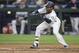 SEATTLE, WA - AUGUST 15: Jarrod Dyson #1 of the Seattle Mariners lays down a sacrifice bunt off of starting pitcher Wade Miley #38 of the Baltimore Orioles and reached on a fielder's choice during the fifth inning of a game at Safeco Field on August 15, 2017 in Seattle, Washington. (Photo by Stephen Brashear/Getty Images)