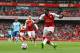 Arsenal's English striker Danny Welbeck shoots to score his second and his team's third goal during the English Premier League football match between Arsenal and Bournemouth at the Emirates Stadium in London on September 9, 2017. / AFP PHOTO / Ian KINGTON / RESTRICTED TO EDITORIAL USE. No use with unauthorized audio, video, data, fixture lists, club/league logos or 'live' services. Online in-match use limited to 75 images, no video emulation. No use in betting, games or single club/league/player publications. / (Photo credit should read IAN KINGTON/AFP/Getty Images)