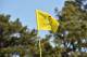 A flag with Masters logo is pictured during Round 3 of the 80th Masters Golf Tournament at the Augusta National Golf Club on April 9, 2016, in Augusta, Georgia. / AFP / Nicholas Kamm (Photo credit should read NICHOLAS KAMM/AFP/Getty Images)