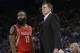 Houston Rockets' James Harden (13) and head coach Kevin McHale talk during an NBA basketball game against the Golden State Warriors in Oakland, Calif., Wednesday, Jan. 21, 2015. (AP Photo/Jeff Chiu)