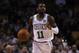 Boston Celtics guard Kyrie Irving brings the ball up court during the first quarter of an NBA preseason basketball game in Boston, Monday, Oct. 2, 2017. (AP Photo/Charles Krupa)