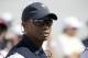 Tiger Woods looks on before the first round of the Presidents Cup at Liberty National Golf Club in Jersey City, N.J., Thursday, Sept. 28, 2017. (AP Photo/Julio Cortez)