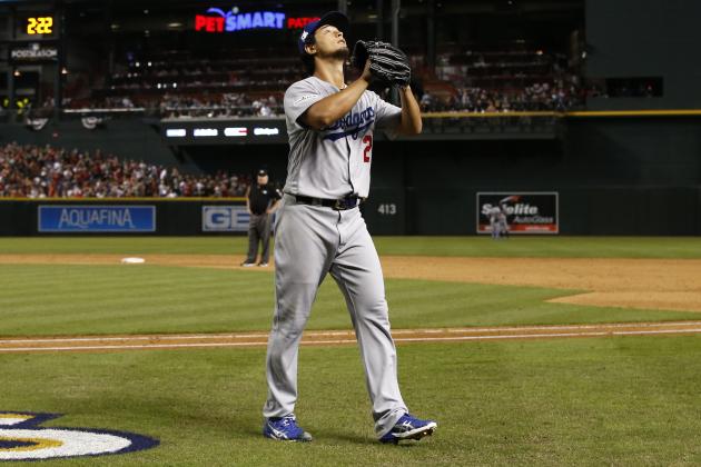 Los Angeles Dodgers starting pitcher Yu Darvish (21) leaves the game during the sixth inning of game 3 of baseball's National League Division Series against the Arizona Diamondbacks, Monday, Oct. 9, 2017, in Phoenix. (AP Photo/Ross D. Franklin)
