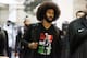 San Francisco 49ers quarterback Colin Kaepernick enters the Georgia Dome with team mates before the first half of an NFL football game between the Atlanta Falcons and the San Francisco 49ers, Sunday, Dec. 18, 2016, in Atlanta. (AP Photo/Butch Dill)