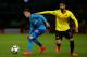 WATFORD, ENGLAND - OCTOBER 14: Arsenal's Mesut Ozil looks to hold the ball up from Watford's Miguel Britos during the Premier League match between Watford and Arsenal at Vicarage Road on October 14, 2017 in Watford, England. (Photo by Charlie Crowhurst/Getty Images)
