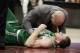 Boston Celtics' Gordon Hayward grimaces in pain in the first half of an NBA basketball game against the Cleveland Cavaliers, Tuesday, Oct. 17, 2017, in Cleveland. Just five minutes into his Boston career, new Celtics star forward Gordon Hayward gruesomely broke his left ankle, an injury that may end his season. (AP Photo/Tony Dejak)