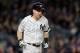 NEW YORK, NY - OCTOBER 16: Todd Frazier #29 of the New York Yankees walks during the fourth inning against the Houston Astros in Game Three of the American League Championship Series at Yankee Stadium on October 16, 2017 in the Bronx borough of New York City. (Photo by Elsa/Getty Images)
