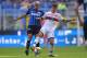 Inter Milan's Brazilian defender Miranda (L)vies with Genoa's Italian forward Pietro Pellegri during the Italian Serie A football match Inter Milan vs Genoa at the San Siro stadium in Milan on September 24, 2017. / AFP PHOTO / MARCO BERTORELLO (Photo credit should read MARCO BERTORELLO/AFP/Getty Images)