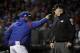Chicago Cubs manager Joe Maddon argues with referees during the eighth inning of Game 4 of baseball's National League Championship Series against the Los Angeles Dodgers, Wednesday, Oct. 18, 2017, in Chicago. Maddon was ejected from the game. (AP Photo/Matt Slocum)