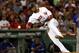 Boston Red Sox third baseman Eduardo Nunez throws out Toronto Blue Jays' Jose Bautista during the eighth inning of a baseball game at Fenway Park in Boston Tuesday, Sept. 5, 2017. (AP Photo/Winslow Townson)