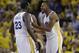 Golden State Warriors forward Draymond Green (23) and forward Andre Iguodala (9) celebrate during the second half of Game 1 of basketball's NBA Finals against the Cleveland Cavaliers in Oakland, Calif., Thursday, June 1, 2017. (AP Photo/Marcio Jose Sanchez)