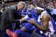 WASHINGTON, DC - OCTOBER 18: Head coach Brett Brown of the Philadelphia 76er talks with Joel Embiid #25 in the first half against the Washington Wizards at Capital One Arena on October 18, 2017 in Washington, DC. NOTE TO USER: User expressly acknowledges and agrees that, by downloading and or using this photograph, User is consenting to the terms and conditions of the Getty Images License Agreement. (Photo by Rob Carr/Getty Images)