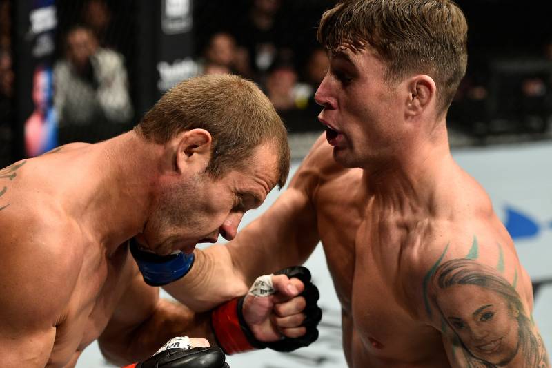 GDANSK, POLAND - OCTOBER 21: (R-L) Darren Till of England punches Donald Cerrone in their welterweight bout during the UFC Fight Night event inside Ergo Arena on October 21, 2017 in Gdansk, Poland. (Photo by Jeff Bottari/Zuffa LLC/Zuffa LLC via Getty Images)
