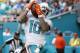 Miami Dolphins wide receiver Kenny Stills (10) catches a touchdown pass over New York Jets cornerback Buster Skrine (41), during the second half of an NFL football game, Sunday, Oct. 22, 2017, in Miami Gardens, Fla. (AP Photo/Wilfredo Lee)