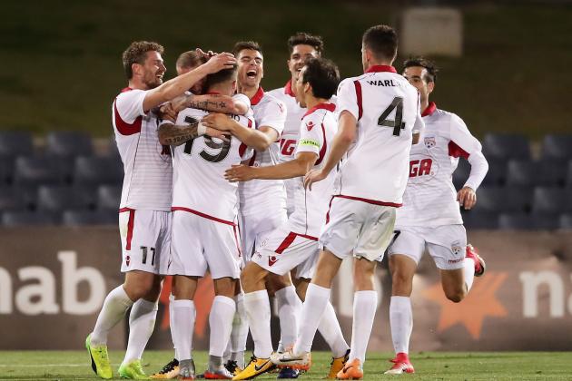 SYDNEY, AUSTRALIA - OCTOBER 24:  Daniel Adlung of United celebrates with team mates after scoring a goal during the FFA Cup Semi Final match between the Western Sydney Wanderers and Adelaide United at Campbelltown Sports Stadium on October 24, 2017 in Sydney, Australia.  (Photo by Matt King/Getty Images)