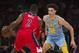 Los Angeles Lakers guard Lonzo Ball, right, defends Washington Wizards guard John Wall during the second half of an NBA basketball game in Los Angeles, Wednesday, Oct. 25, 2017. (AP Photo/Kyusung Gong)