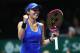 SINGAPORE - OCTOBER 26: Martina Hingis of Switzerland partnering Chan Yung-Jan of Chinese Taipei celebrates victory in their doubles match against Kveta Peschke of Czech Republic and Anna-Lena Groenefeld of Germany during day 5 of the BNP Paribas WTA Finals Singapore presented by SC Global at Singapore Sports Hub on October 26, 2017 in Singapore. (Photo by Clive Brunskill/Getty Images)