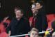 (L-R) Liverpool Chairman Tom Werner, Liverpool's US owner John W. Henry and Henry's film producer wife Linda Pizzuti take their places for the English Premier League football match between Liverpool and Sunderland at Anfield in Liverpool, north west England on November 26, 2016. / AFP / Paul ELLIS / RESTRICTED TO EDITORIAL USE. No use with unauthorized audio, video, data, fixture lists, club/league logos or 'live' services. Online in-match use limited to 75 images, no video emulation. No use in betting, games or single club/league/player publications. / (Photo credit should read PAUL ELLIS/AFP/Getty Images)