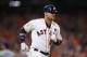 HOUSTON, TX - OCTOBER 27: Yuli Gurriel #10 of the Houston Astros reacts after hitting a solo home run during the second inning against the Los Angeles Dodgers in game three of the 2017 World Series at Minute Maid Park on October 27, 2017 in Houston, Texas. (Photo by Ezra Shaw/Getty Images)