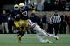 SOUTH BEND, IN - OCTOBER 28: Jarius Morehead #31 of the North Carolina State Wolfpack attempts to tackle Josh Adams #33 of the Notre Dame Fighting Irish in the first quarter at Notre Dame Stadium on October 28, 2017 in South Bend, Indiana. (Photo by Dylan Buell/Getty Images)