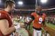 Georgia quarterback Jake Fromm (11) speaks with Georgia wide receiver Jeremiah Holloman (9) after an NCAA college football game against Mississippi State, Saturday, Sept. 23, 2017, in Athens, Ga. Georgia won 31-3. (AP Photo/Mike Stewart)