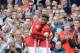 Manchester United's English striker Wayne Rooney (L) is substituted for Manchester United's English midfielder Angel Gomes (R) during the English Premier League football match between Manchester United and Cyrstal Palace at Old Trafford in Manchester, north west England, on May 21, 2017. / AFP PHOTO / Oli SCARFF / RESTRICTED TO EDITORIAL USE. No use with unauthorized audio, video, data, fixture lists, club/league logos or 'live' services. Online in-match use limited to 75 images, no video emulation. No use in betting, games or single club/league/player publications. / (Photo credit should read OLI SCARFF/AFP/Getty Images)