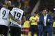 Valencia's coach Marcelino (R) celebrates his team's goal during the Spanish league football match Valencia CF vs Sevilla FC at the Mestalla stadium in Valencia on October 21, 2017. / AFP PHOTO / JOSE JORDAN (Photo credit should read JOSE JORDAN/AFP/Getty Images)