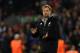 Liverpool's German manager Jurgen Klopp applauds supporters on the pitch after the UEFA Champions League Group E football match between Liverpool and NK Maribor at Anfield in Liverpool, north-west England on November 1, 2017.
Liverpool won the game 3-0. / AFP PHOTO / Paul ELLIS (Photo credit should read PAUL ELLIS/AFP/Getty Images)
