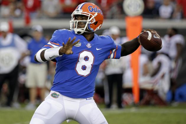 Florida quarterback Malik Zaire looks for a receiver against Georgia in the second half of an NCAA college football game, Saturday, Oct. 28, 2017, in Jacksonville, Fla. Georgia won 42-7. (AP Photo/John Raoux)