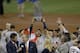 The Houston Astros' Carlos Correa celebrates with the trophy after their win against the Los Angeles Dodgers in Game 7 of baseball's World Series Wednesday, Nov. 1, 2017, in Los Angeles. The Astros won 5-1 to win the series 4-3. (AP Photo/Alex Gallardo)