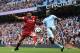 Liverpool's German midfielder Emre Can (L) vies with Manchester City's French defender Benjamin Mendy during the English Premier League football match between Manchester City and Liverpool at the Etihad Stadium in Manchester, north west England, on September 9, 2017. / AFP PHOTO / Oli SCARFF / RESTRICTED TO EDITORIAL USE. No use with unauthorized audio, video, data, fixture lists, club/league logos or 'live' services. Online in-match use limited to 75 images, no video emulation. No use in betting, games or single club/league/player publications. / (Photo credit should read OLI SCARFF/AFP/Getty Images)