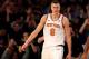 NEW YORK, NY - NOVEMBER 03:  Kristaps Porzingis #6 of the New York Knicks reacts after a dunk in the fourth quarter against the Phoenix Suns at Madison Square Garden on November 3, 2017 in New York City. NOTE TO USER: User expressly acknowledges and agrees that, by downloading and or using this Photograph, user is consenting to the terms and conditions of the Getty Images License Agreement  (Photo by Elsa/Getty Images)