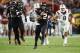 Miami quarterback Malik Rosier (12) runs for yardage during the first half of an NCAA College football game against Virginia Tech, Saturday, Nov. 4, 2017 in Miami Gardens, Fla. (AP Photo/Wilfredo Lee)