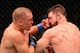 NEW YORK, NY - NOVEMBER 04: Georges St-Pierre of Canada lands a punch to take down Michael Bisping of England in their UFC middleweight championship bout during the UFC 217 event at Madison Square Garden on November 4, 2017 in New York City. (Photo by Josh Hedges/Zuffa LLC/Zuffa LLC via Getty Images)