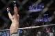 Georges St-Pierre, of Canada, celebrates after winning a middleweight title mixed martial arts bout against England's Michael Bisping at UFC 217 early Sunday, Nov. 5, 2017, in New York. (AP Photo/Frank Franklin II)