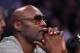 FILE - In this March 30, 2016, file photo, former Los Angeles Lakers' player Lamar Odom watches during the second half of an NBA basketball game between the Lakers and the Miami Heat in Los Angeles. Odom told Us Weekly for a story published online March 29, 2017, that he is “a walking miracle” after being found unconscious with cocaine in his system in a Nevada brothel in 2015. (AP Photo/Mark J. Terrill, File)