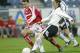 Denis Dasoul von Bregenz, rechts, kaempft am Mittwoch, 7. April 2004, beim Bundesligaspiel GAK gegen Bregenz im Schwarzenegger-Stadion, mit GAKs Libor Sinoko um den Ball. (AP Photo/Markus Leodolter)