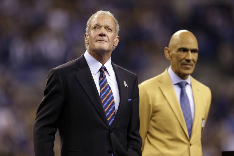 Former Indianapolis Colts' head coach Tony Dungy, right, is honored along side Colts owner Jim Irsay during halftime of half an NFL football game between the Indianapolis Colts and the Pittsburgh Steelers Thursday, Nov. 24, 2016, in Indianapolis. (AP Photo/Michael Conroy)