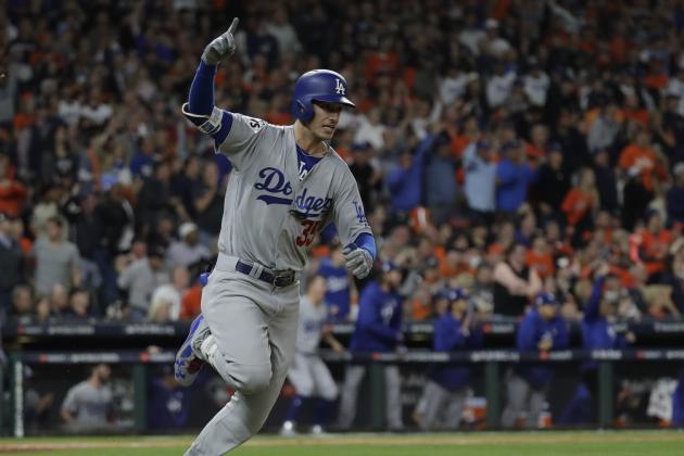 Los Angeles Dodgers' Cody Bellinger reacts after hitting an RBI double during the ninth inning of Game 4 of baseball's World Series against the Houston Astros Saturday, Oct. 28, 2017, in Houston. (AP Photo/David J. Phillip)