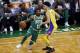 Boston Celtics' Kyrie Irving drives past Los Angeles Lakers' Lonzo Ball during the first quarter of an NBA basketball game in Boston on Wednesday, Nov. 8, 2017. (AP Photo/Winslow Townson)