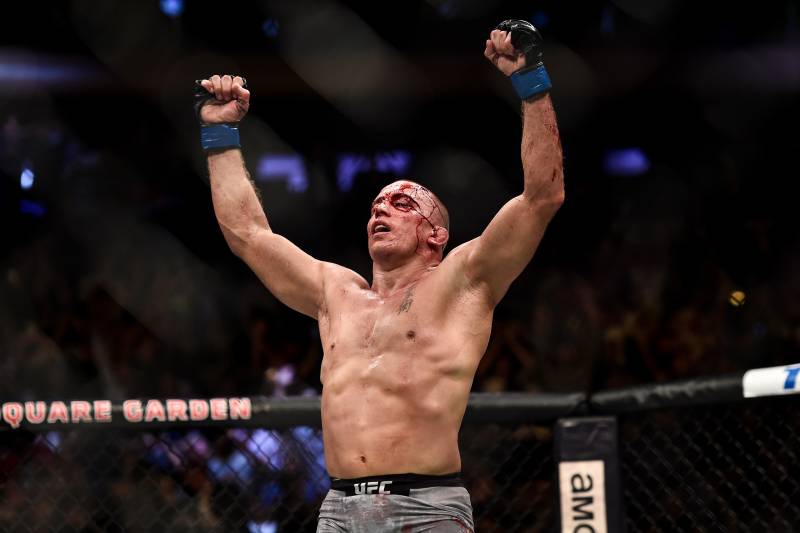 NEW YORK, NY - NOVEMBER 04: Georges St-Pierre of Canada celebrates his submission victory over Michael Bisping of England in their UFC middleweight championship bout during the UFC 217 event inside Madison Square Garden on November 4, 2017 in New York City. (Photo by Brandon Magnus/Zuffa LLC/Zuffa LLC via Getty Images)