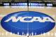 FILE - In this March 18, 2015, file photo, the NCAA logo is at center court as work continues at The Consol Energy Center in Pittsburgh, for the NCAA college basketball second and third round games. The NCAA is moving toward reforming transfer rules. There is much work to be done and any drastic changes are likely a few years away. New transfer rules will be rooted in academics, and could give higher achieving students more freedom while limiting who might be less likely to graduate if they switch schools.(AP Photo/Keith Srakocic, File)